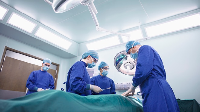 Four Healthcare Professionals in Operating Room