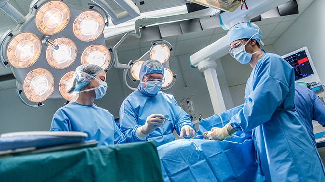 Four Healthcare Professionals in Operating Room